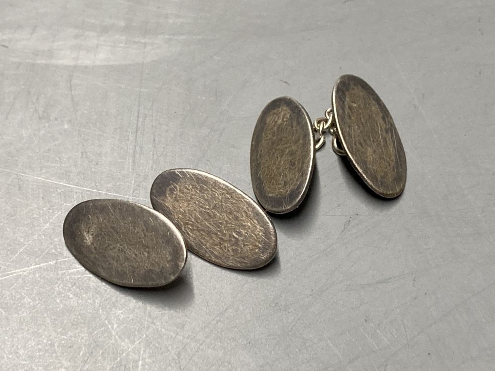 Two pairs of 9ct yellow gold oval cufflinks, a pair of silver cufflinks and two stick pins